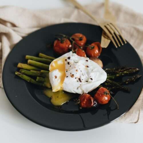 close up photo of asparagus on plate